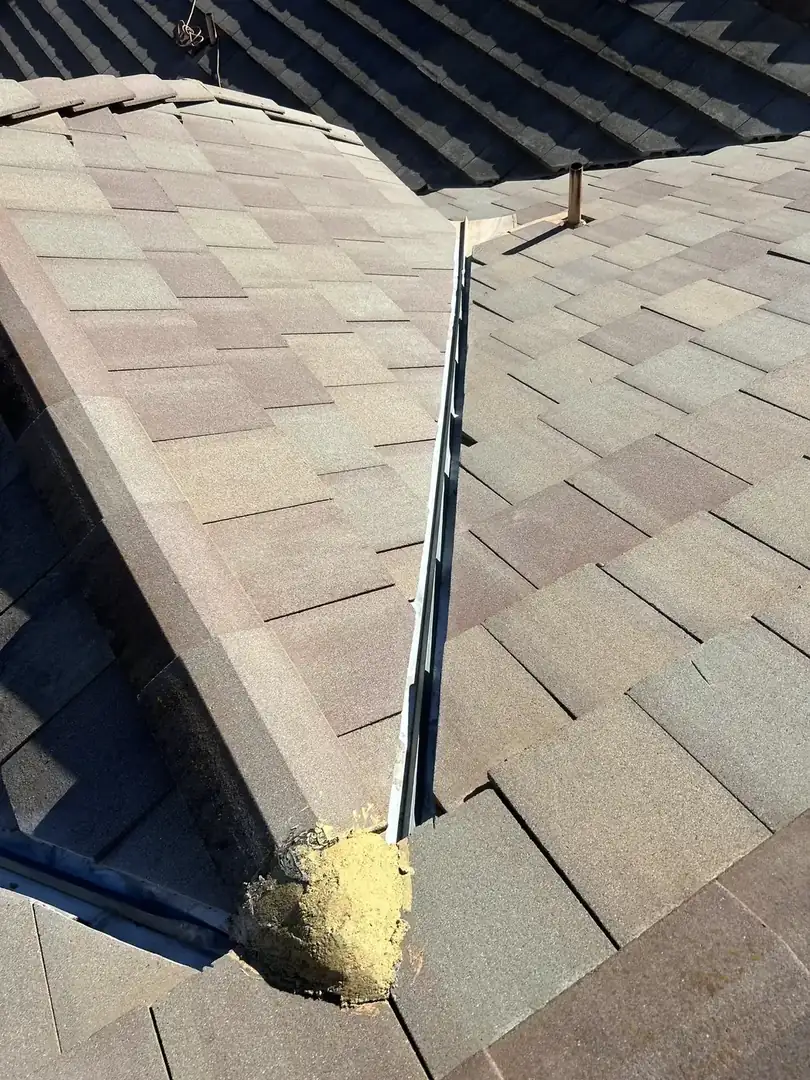 Roof tune-up valley cleaning on a tile roof