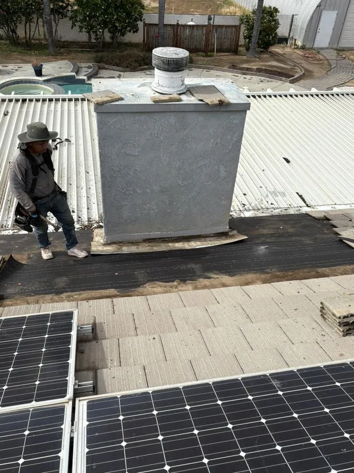 Roof coating applied to a low-slope roof