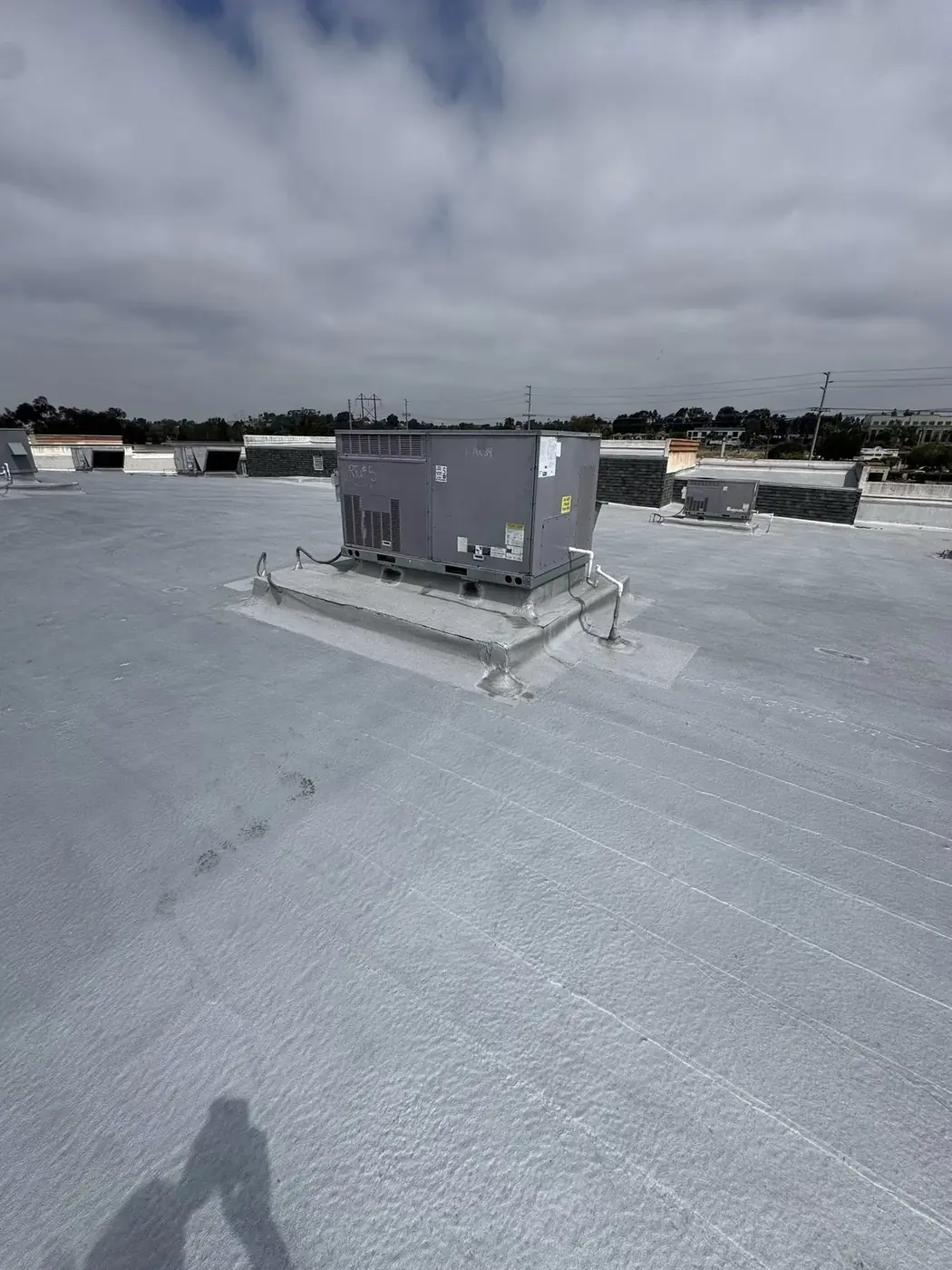 Roofing specialist resetting slipped tiles