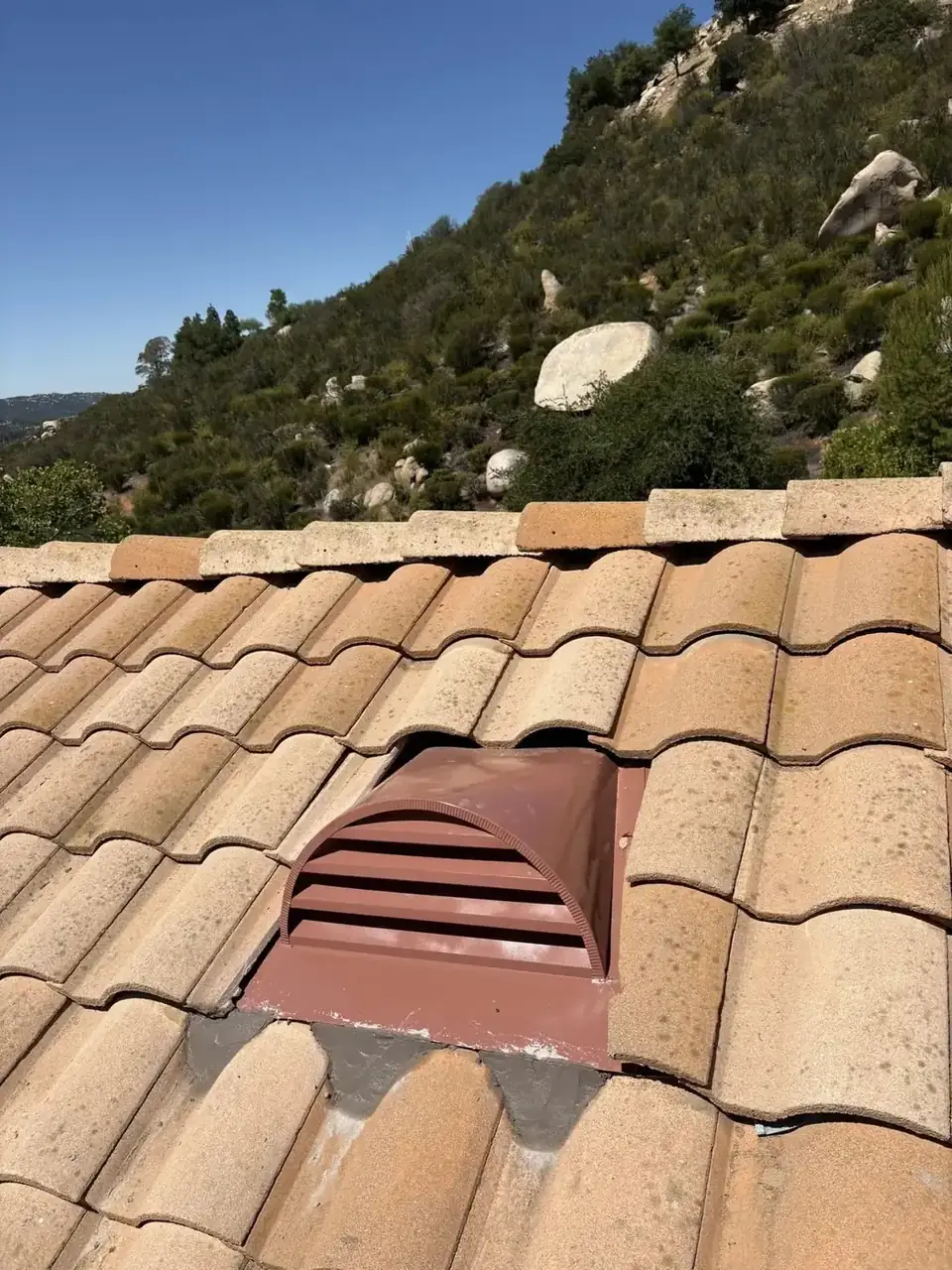 Emergency roof repair on a storm-damaged roof