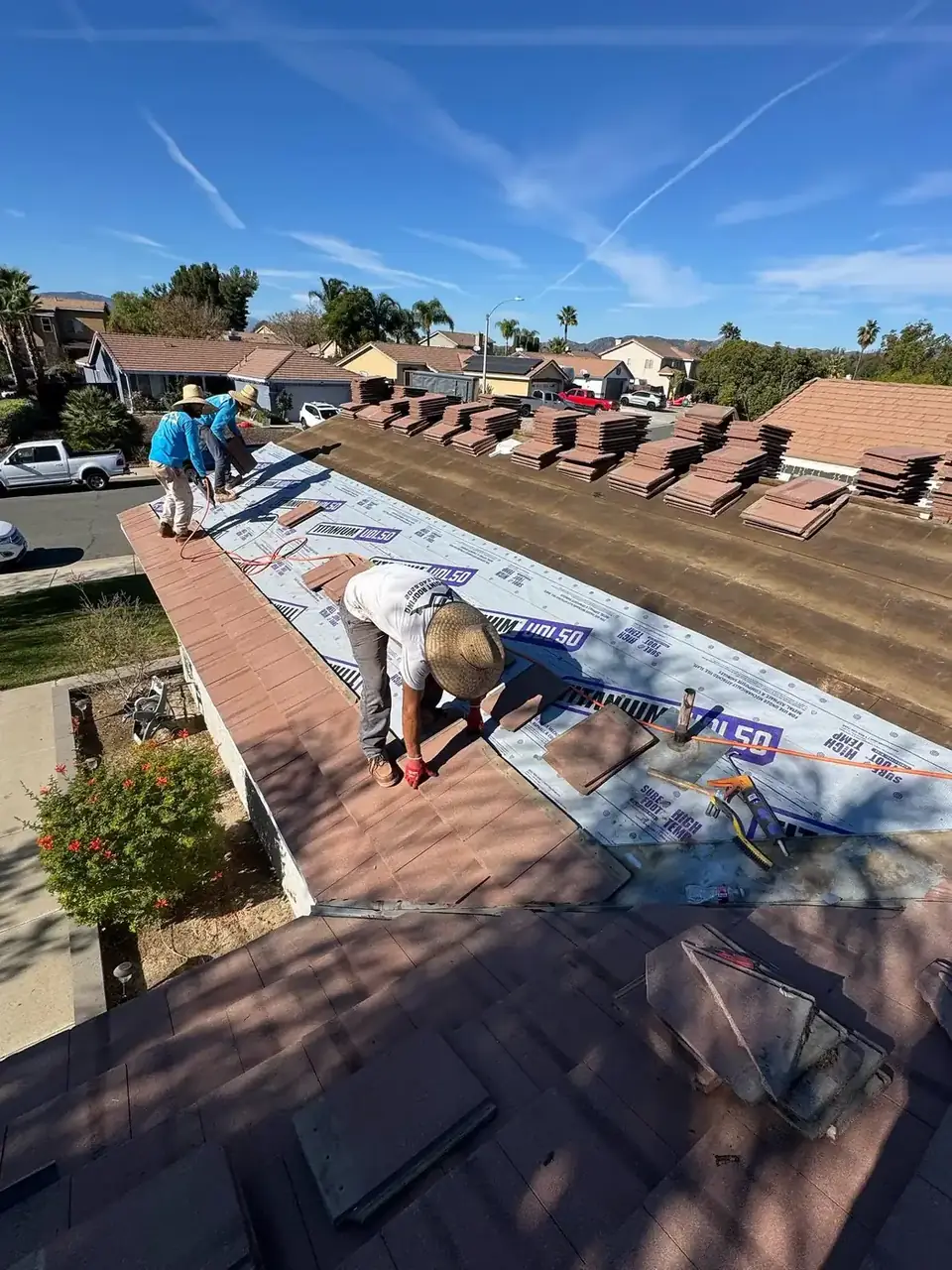 New underlayment and flashings installed during a tile relay